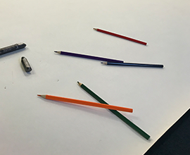 Pencils scattered on paper